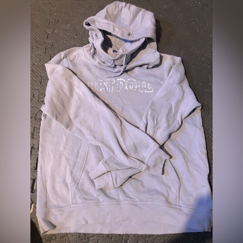 Nike cowl neck hoodie with front pocket. Nike logo has a metallic sheen